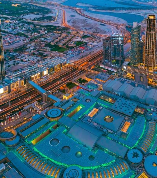 Aerial View Of Evening Night Scenic View Of Skyscraper. Night Traffic In Residential District in Dubai. Street Night Illumination. Night Scenic View Of Dubai Skyline. High quality photo Aerial View Of Evening Night Scenic View Of Skyscraper. Night Traffic In Residential District in Dubai. Street Night Illumination. Night Scenic View Of Dubai Skyline. High quality photo.